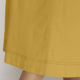 Close View of a Model wearing Light Yellow Vegetable Dyed A-Line Paneled Dress