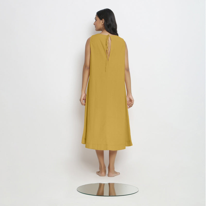 Back View of a Model wearing Light Yellow Vegetable Dyed A-Line Paneled Dress