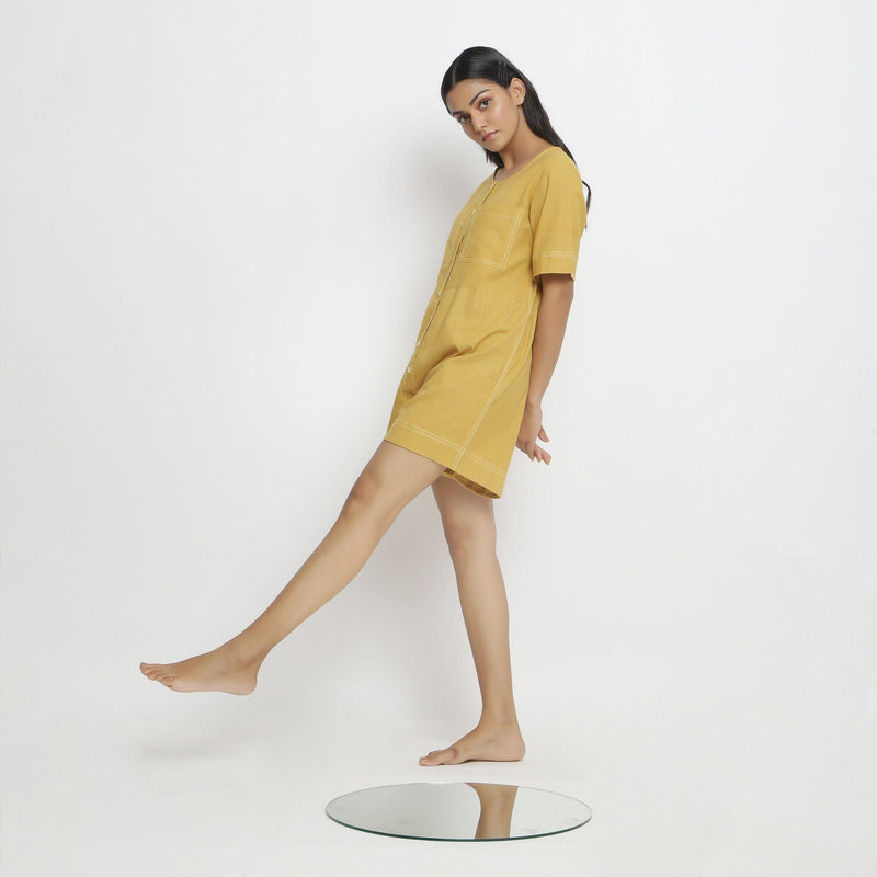 Left View of a Model wearing Light Yellow Vegetable Dyed Romper