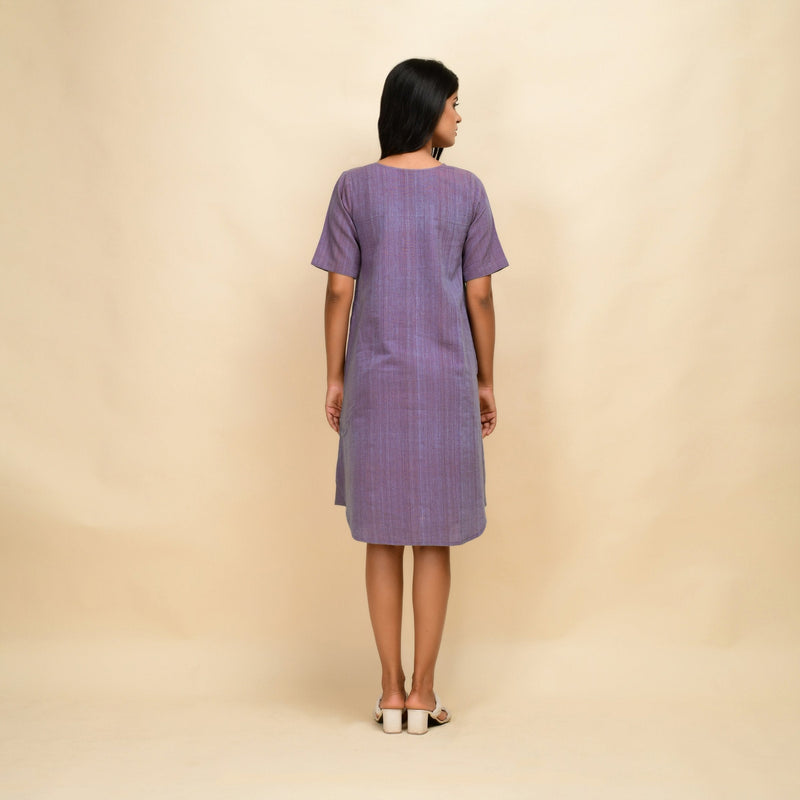 Back View of a Model wearing Lilac 100% Cotton Knee Length Dress