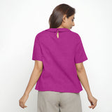 Back View of a Model wearing Magenta 100% Linen Keyhole Neck Peter Pan Collar Top