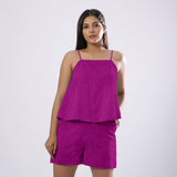 Front View of a Model wearing Magenta 100% Linen Flared Relaxed Camisole Top