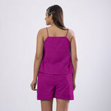 Back View of a Model wearing Magenta 100% Linen Flared Relaxed Camisole Top