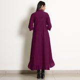 Back View of a Model wearing Magenta Frilled Neck High Low Dress