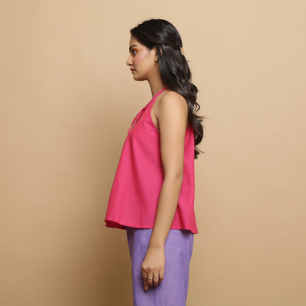 Left View of a Model wearing Magenta Hand-Embroidered Flared Top