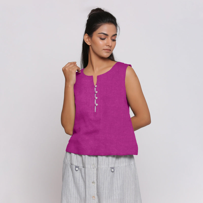 Front View of a Model wearing Magenta Linen Split Neck Button-Down Sleeveless Top