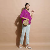 Right View of a Model wearing Magenta 100% Linen Split-Neck Tunic Top