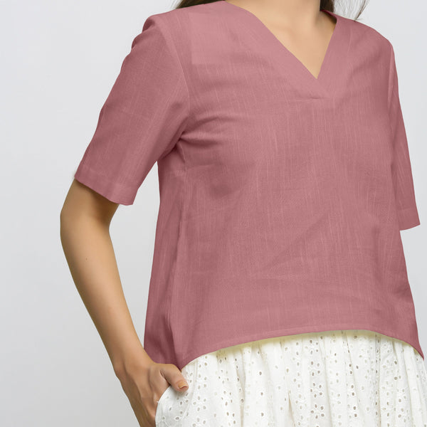 Front Detail of a Model wearing Magenta Yarn Dyed Cotton V-Neck High-Low Top