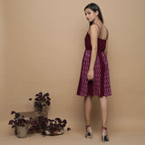Back View of a Model wearing Maroon Ikat Handwoven Cotton Paneled Knee Length Dress