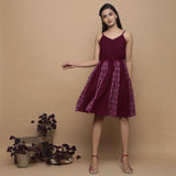 Front View of a Model wearing Maroon Ikat Handwoven Cotton Paneled Knee Length Dress