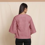 Back View of a Model wearing Maroon Comfy Straight Top