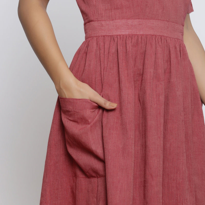 Right Detail of a Model wearing Maroon Backless Fit and Flare Dress