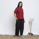Right View of a Model wearing Maroon Handspun Cotton Button-Down Top