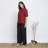Left View of a Model wearing Maroon Handspun Cotton Button-Down Top