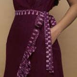 Front Detail of a Model wearing Maroon Handspun Cotton Asymmetrical Midi Wrap Dress