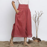 Right View of a Model wearing Maroon Handspun Flared High Rise Pant