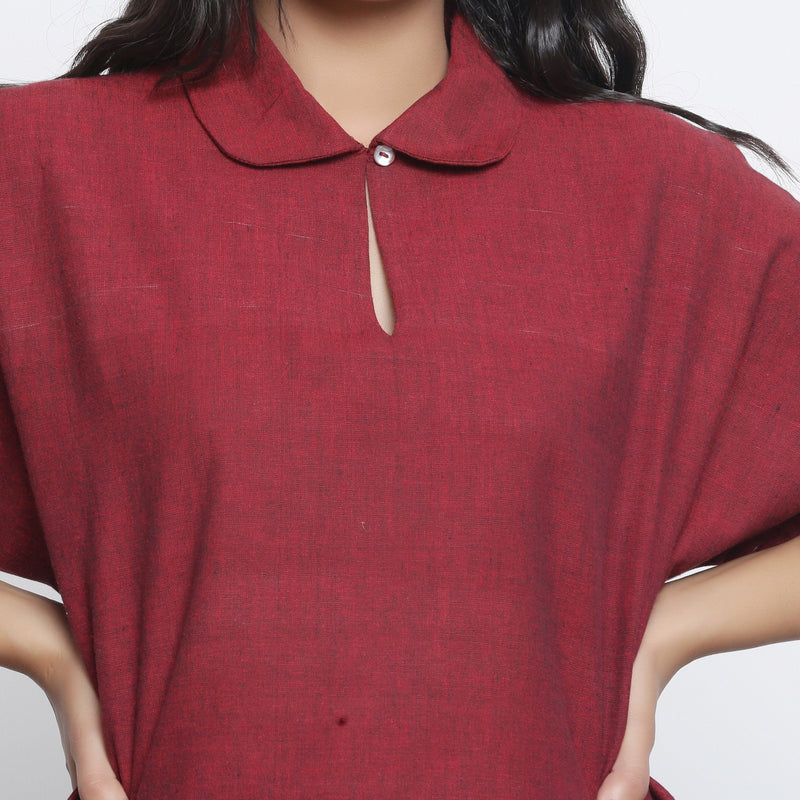 Front Detail of a Model wearing Maroon Handspun 100% Cotton Loose Fit Keyhole Neck Top