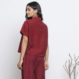 Back View of a Model wearing Maroon Handspun 100% Cotton Loose Fit Keyhole Neck Top