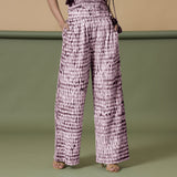 Front View of a Model wearing Maroon Shibori 100% Cotton Paperbag Pant
