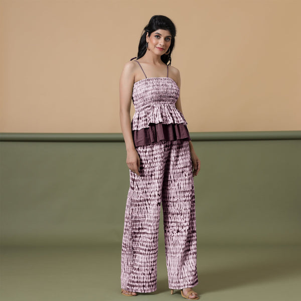Right View of a Model wearing Maroon Shibori 100% Cotton Paperbag Pant