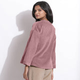 Back View of a Model wearing Mauve Cotton Corduroy V-Neck Top