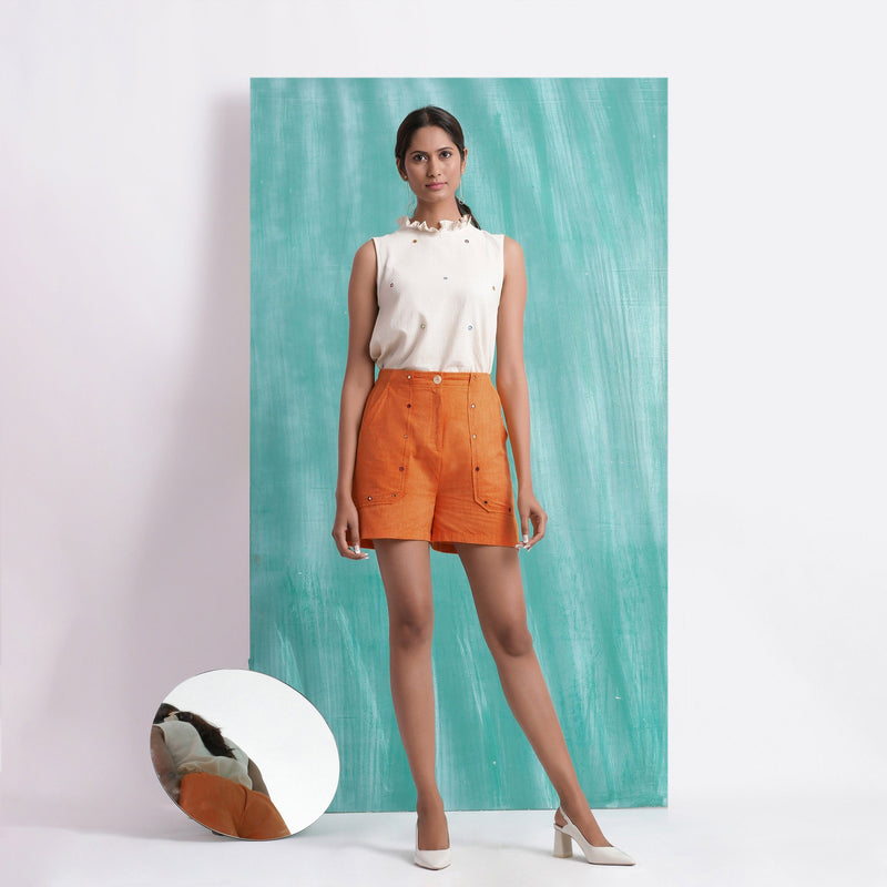 Front View of a Model wearing Melon Orange Handspun Mirror Work Shorts