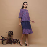 Right View of a Model wearing Midnight Blue Handwoven Ikat Top and Skirt Set