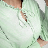 Front Detail of a Model wearing Mint Green Cotton Chambray Midi Dress
