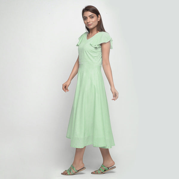 Left View of a Model wearing Mint Green Cotton Fit and Flare Dress