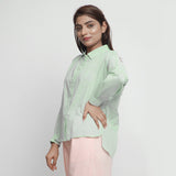 Left View of a Model wearing Mint Green Cotton High-Low Long Top