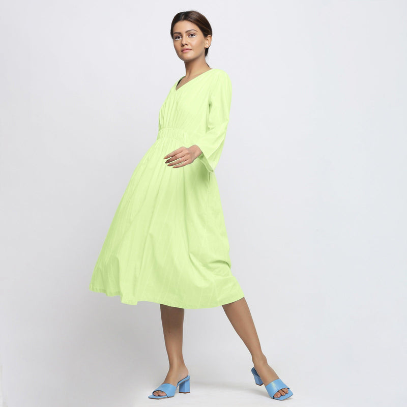 Left View of a Model wearing Mint Green Tie Dyed Fit and Flare Dress