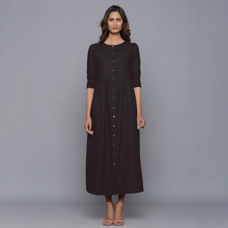 Front View of a Model wearing Moonlight Black Cotton Flannel Gathered Dress