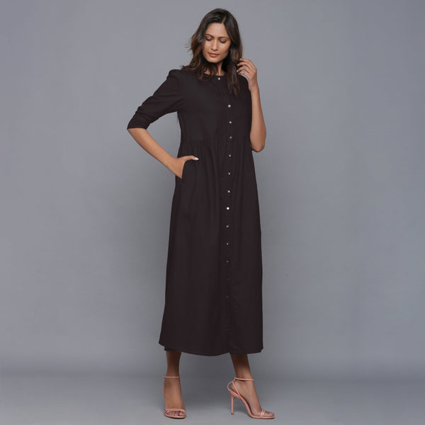 Right View of a Model wearing Moonlight Black Cotton Flannel Gathered Dress