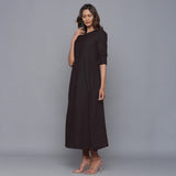 Left View of a Model wearing Moonlight Black Cotton Flannel Gathered Dress
