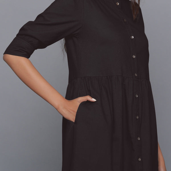 Front Detail of a Model wearing Moonlight Black Cotton Flannel Gathered Dress
