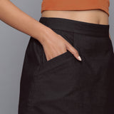 Front Detail of a Model wearing Moonlight Black Flannel Mini Pencil Skirt