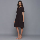 Left View of a Model wearing Moonlight Black Paneled Cotton Flannel Dress