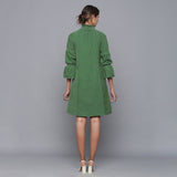 Back View of a Model wearing Moss Green Corduroy High Neck Dress