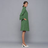 Right View of a Model wearing Moss Green Corduroy High Neck Dress