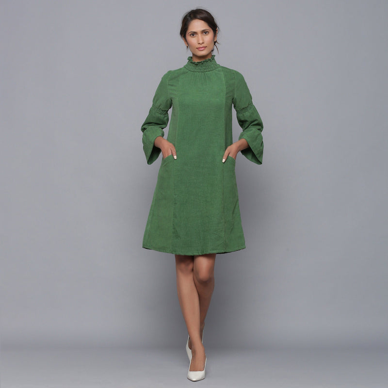 Front View of a Model wearing Moss Green Corduroy High Neck Dress