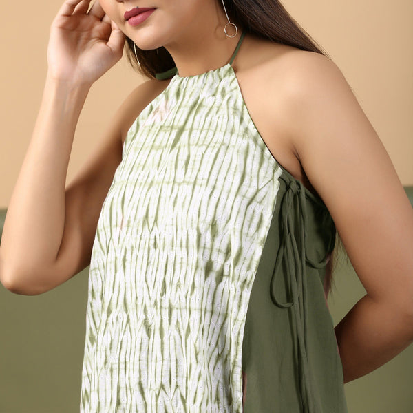 Front Detail of a Model wearing Moss Green Shibori Halter Neck A-Line Dress
