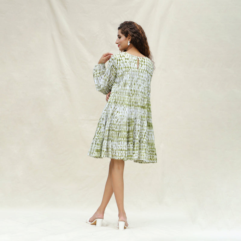 Back View of a Model wearing Moss Green Shibori Tie-Dye Cotton Tier Short Dress