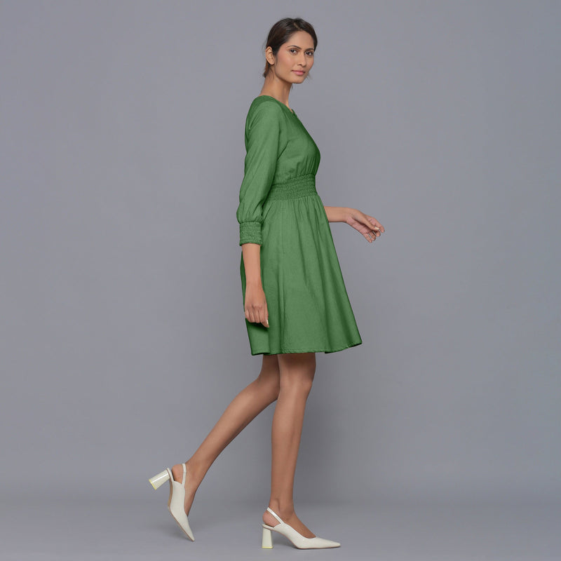 Right View of a Model wearing Moss Green V-Neck Corduroy Dress