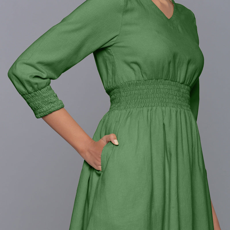 Front Detail of a Model wearing Moss Green V-Neck Corduroy Dress