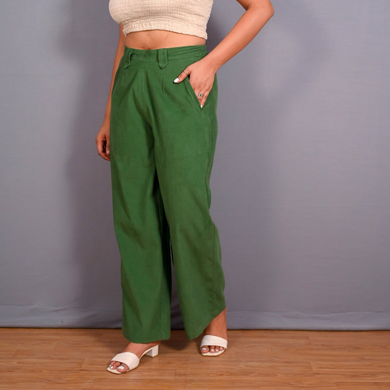 Left View of a Model wearing Moss Green Warm Cotton Corduroy Elasticated Wide Legged Pant