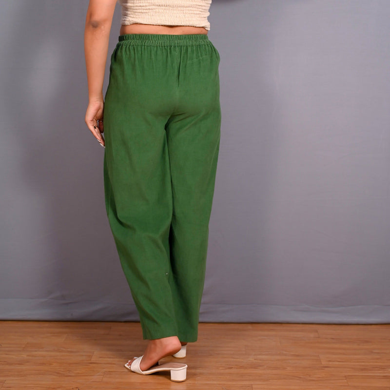 Back View of a Model wearing Moss Green Warm Cotton Corduroy Elasticated Wide Legged Pant