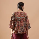 Back View of a Model wearing Muddy Red Block Print Cotton Kalamkari Top