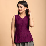 Front View of a Model wearing Mulberry Button Down Pleated Cotton Top