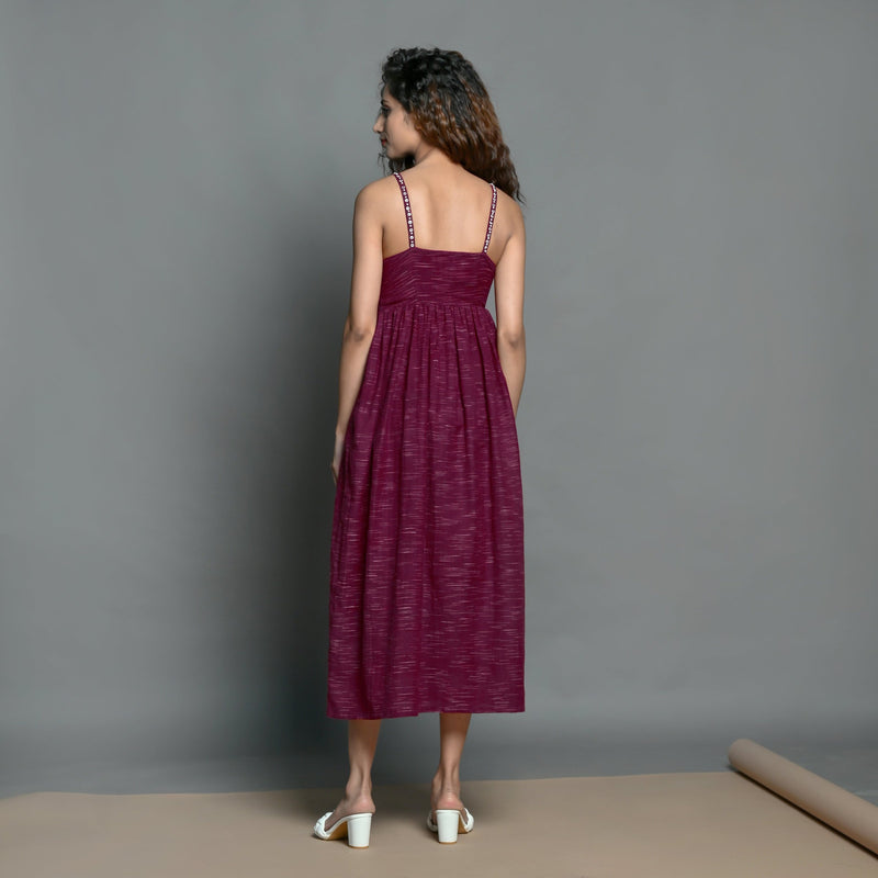 Back View of a Model wearing Mulberry Handspun Cotton Strappy Midi Gathered Dress