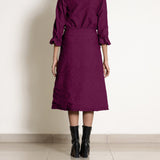 Back View of a Model wearing Warm Mulberry A-Line Frilled Cotton Skirt
